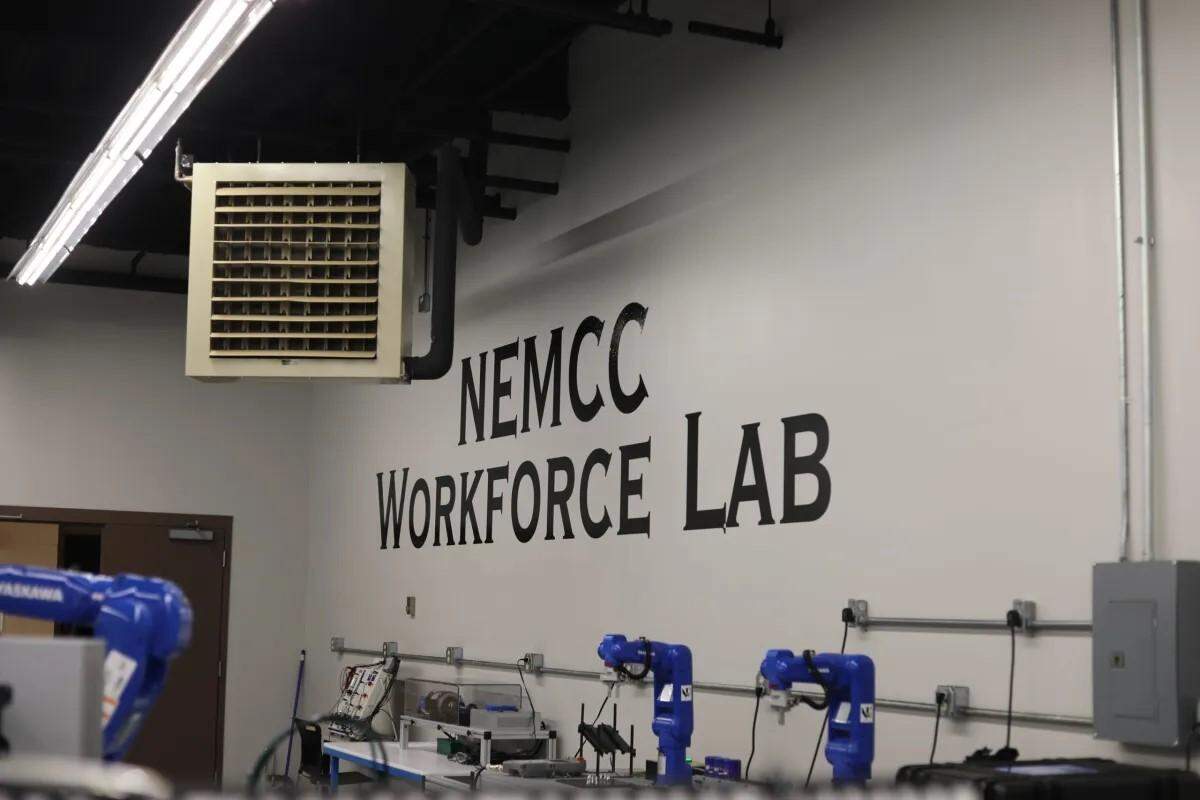 The workforce council toured a classroom that NEMCC recently transformed with paint and new lights last month.