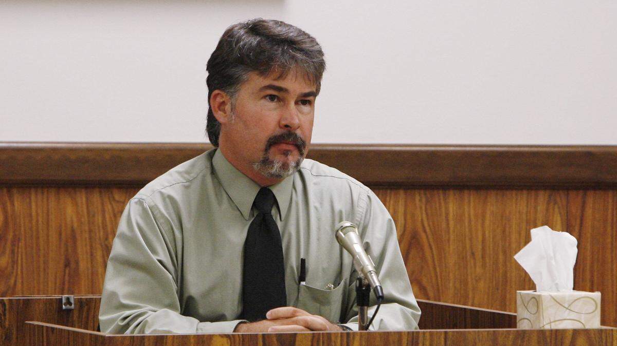 Former Biloxi Police Det. Steve Schlicht, shown testifying in the trial of Paul Graves in 2008, wants escaped killer Michael Floyd Wilson to call him. Schlicht was lead detective when Wilson, known as Pretty Boy Floyd, was being prosecuted in Biloxi MS on several crimes, including one of the two killings that put him in prison on two life sentences. Wilson escaped from prison July 5 and is believed to be on the Mississippi Coast.