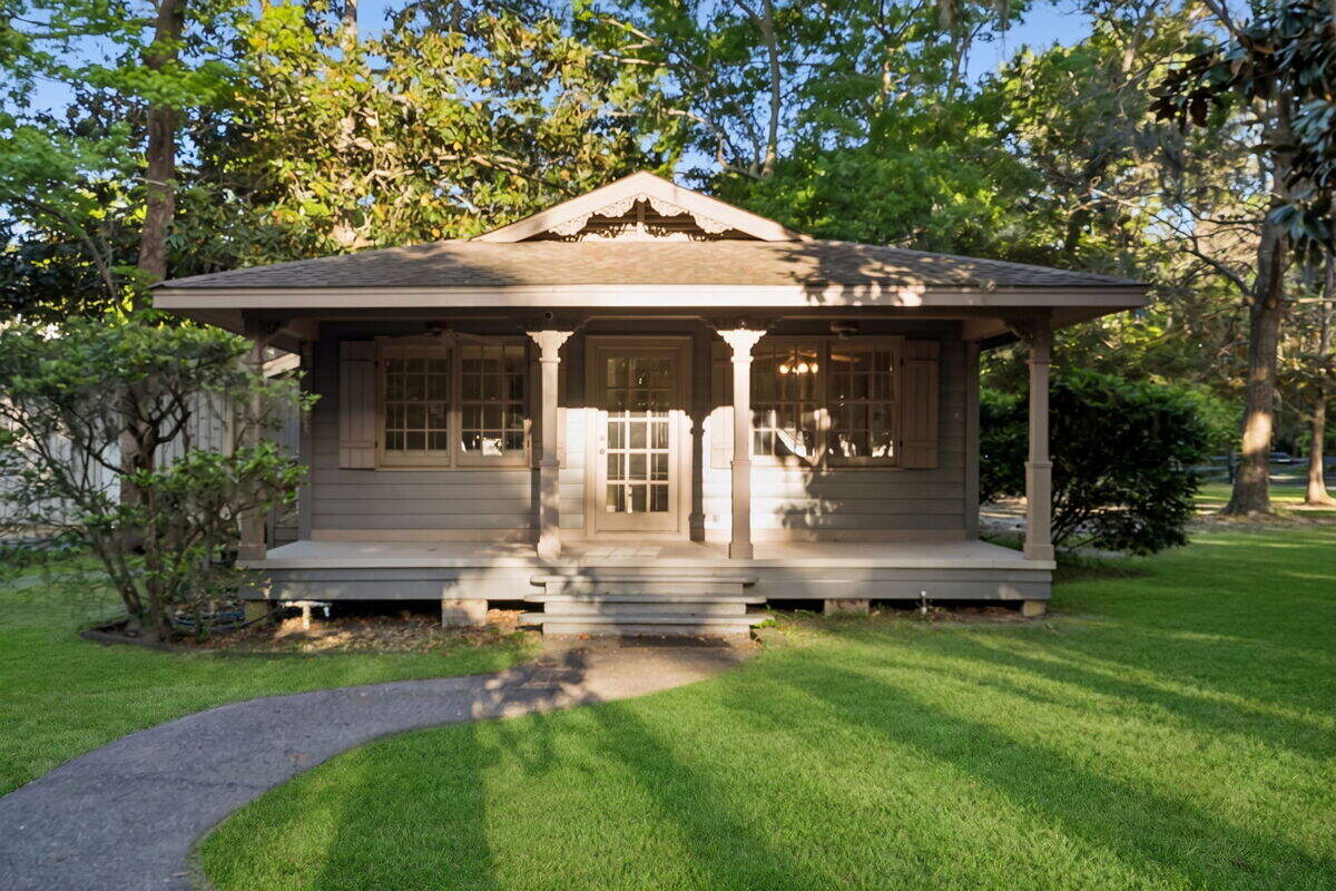 The cottage on waterfront property in Ocean Springs, where two luxury homes also are located.