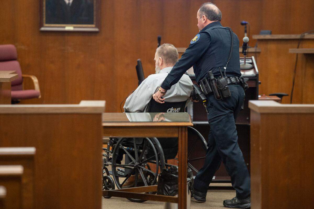 Law enforcement officers wheel Johnny Max Mount out of the courtroom after day one of his trial for the 2015 murder of Julie Brightwell in Harrison County Court in Biloxi on Tuesday, June 13, 2023.