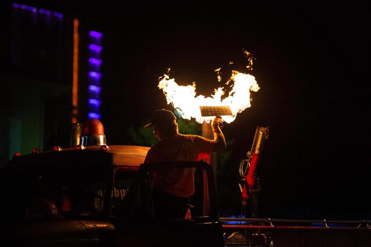 JR McMurray’s 1969 Ford N600 produces flames during a flame throwing competition, where drivers compete to see which car can produce the biggest flames, at Island View Casino in Gulfport during Cruisin’ The Coast on Tuesday, Oct. 5, 2021.
