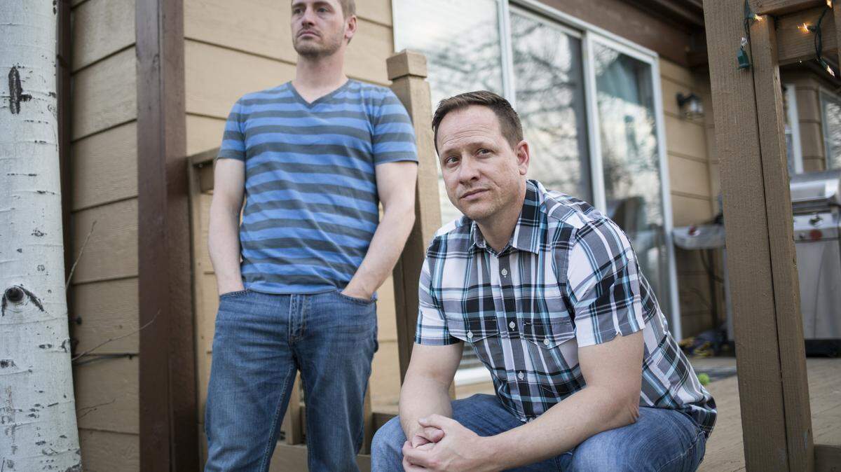Marty, left, and Matthew Reiswig in Centennial, Colo., March 6, 2016. The Reiswigs have a family history of carrying a genetic mutation that causes early-onset AlzheimerÇÙs. Matthew has been tested for the mutation and does not carry it and Marty has chosen not to be tested. (Nick Cote/The New York Times)