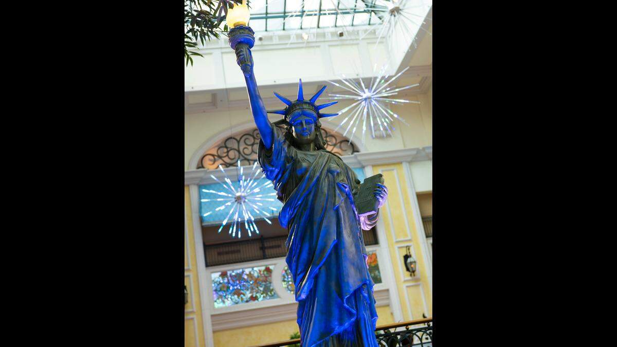 Fireworks sparkle behind the Statue of Liberty in a patriotic summer display at Beau Rivage Resort and Casino in Biloxi.
