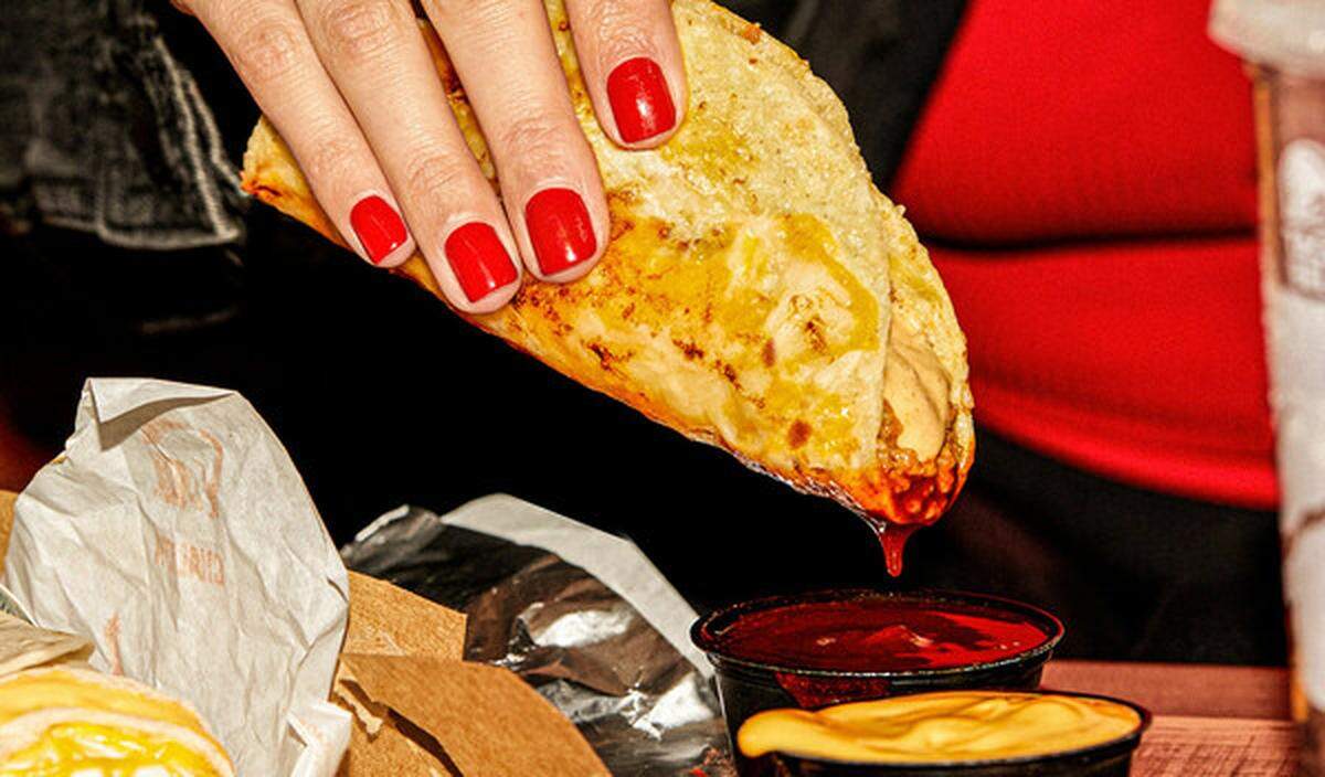 Inspired by the flavors of birria, Taco Bell’s new Grilled Cheese Dipping Taco features slow-braised shredded beef – with a three-cheese blend melted on the inside and grilled on the outside of white corn shell.