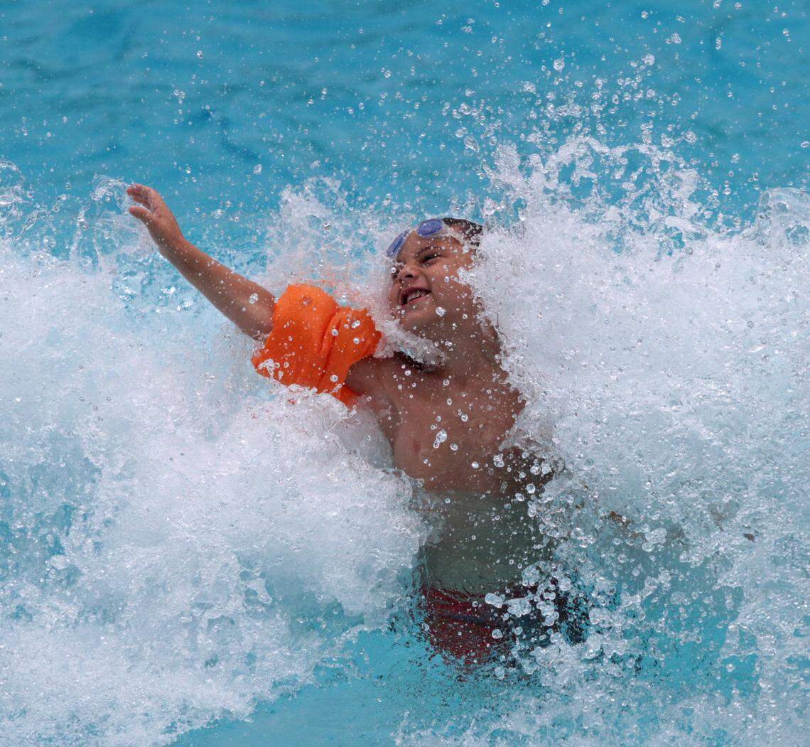 Kids make a splash in the wave pool at Buccaneer Bay Water Park at Buccaneer State Park in Waveland in this file photo. The park opens Memorial Day Weekend with an expansion.