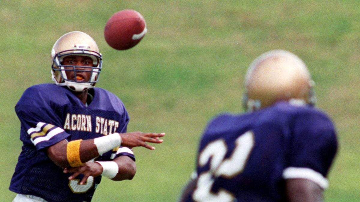 Alcorn State University senior quarterback Steve McNair throws a pass to a  Braves teammate during Alcorn's 1994 home game against Southern University.  McNair retired from the NFL Thursday at the age of 35. He died nine years ago on July 4.