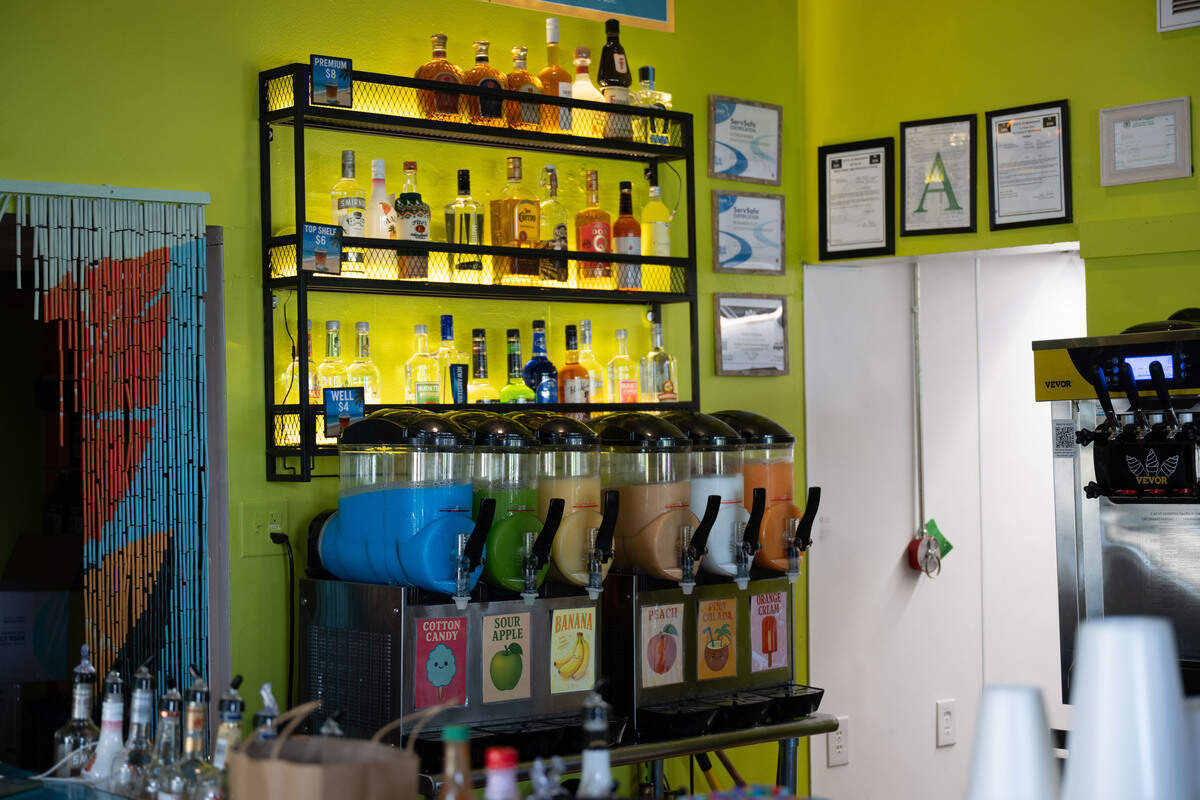 The bar area featuring various daiquiri flavors at Hilltop Daquiris & Tacos in Wiggins on Tuesday, June 23, 2026.