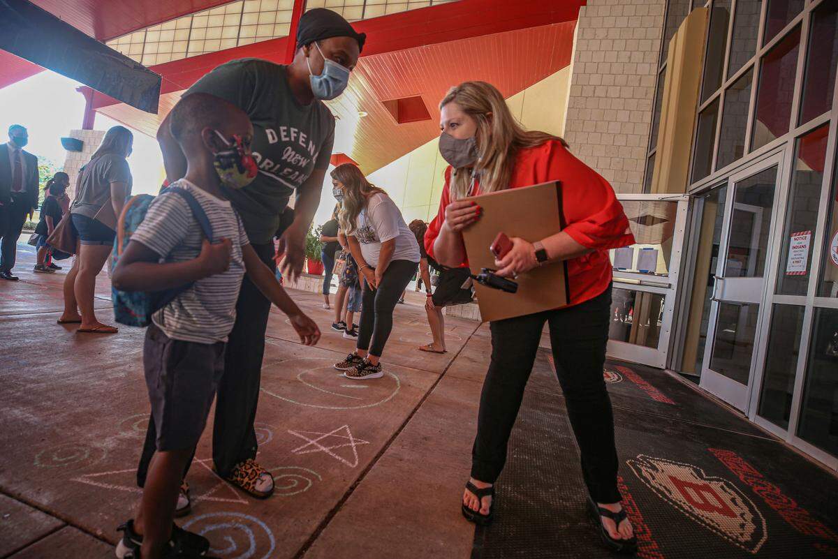 North Bay Elementary staff helps students find their teachers on the first day back to school August 5, 2020.