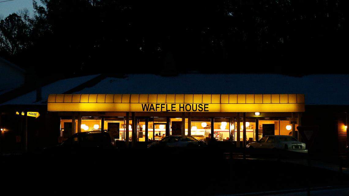 The vehicle had more than 20 bullet holes in its side, media outlets reported. (AP Photo/Brynn Anderson)