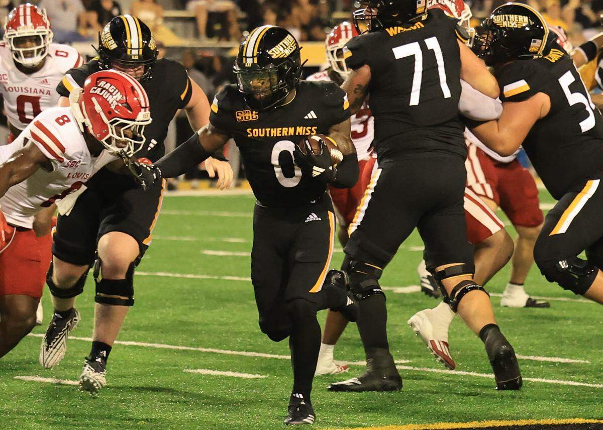Southern Miss running back Rodrigues Clark (0) breaks free Saturday, Oct. 5, 2024, during the Golden Eagles’ loss to the Louisiana Ragin Cajuns in Hattiesburg.