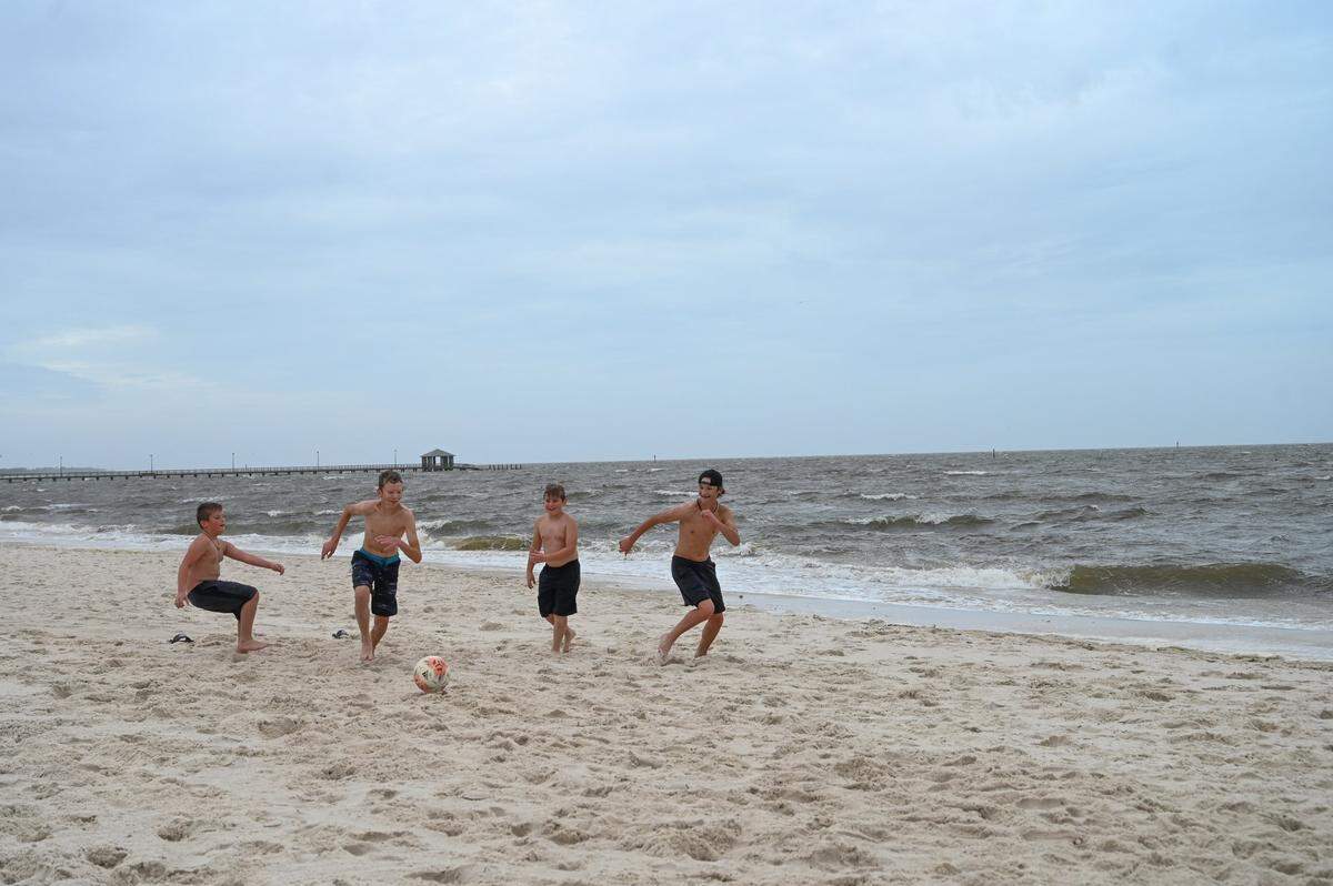 Hurricane Zeta drew weather watchers and others to the beaches in Biloxi before rainfall started Wednesday, Oct. 28, 2020.