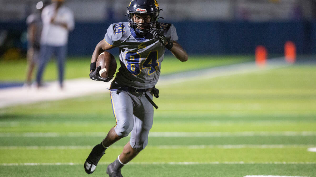 Gautier’s Dillon Alfred carries the ball down the field during a playoff game against Wayne County at Gautier High School in Gautier on Friday, Nov. 11, 2022.