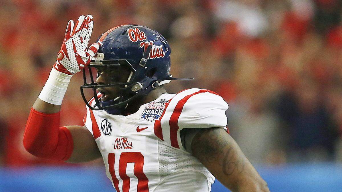 MIKE STEWART/ASSOCIATED PRESS 
 Ole Miss defensive end C.J. Johnson will miss four to six weeks after having surgery Tuesday.
