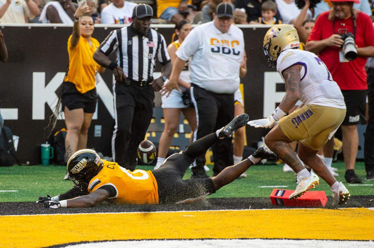 Southern Miss Golden Eagles running back Rodrigues Clark (0) gets knocked out of bounds in the end zone during a Southern Miss game at M.M. Roberts Stadium in Hattiesburg on Saturday, Sept. 2, 2023.