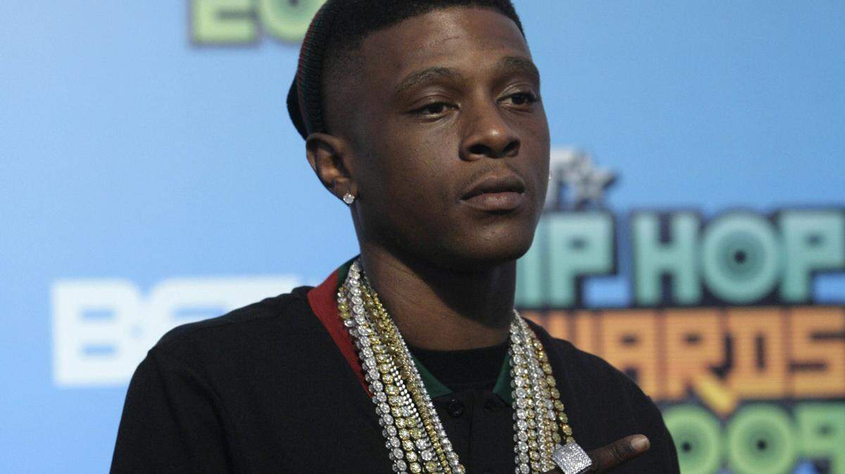 Rapper Boosie Badazz was arrested after he and his entourage were accused of vandalizing property during a concert at State Farm Arena in Atlanta.