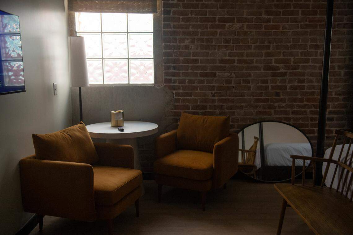 A seating area in a hotel room is shown at Hotel Vela in Gulfport on Thursday, Oct. 31, 2024.