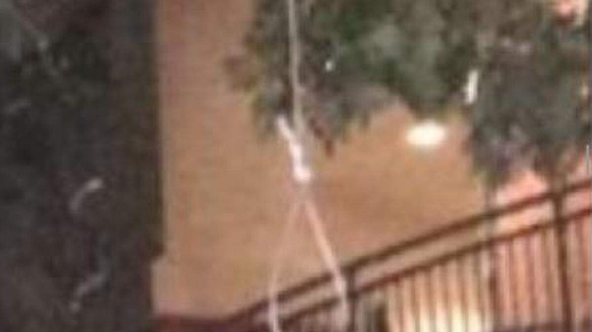 This picture of a noose and a barely visible bicycle hanging from a tree outside the University of South Alabama cafeteria shows part of what caused controversy along with a tweet from the company that handles the university’s food services.