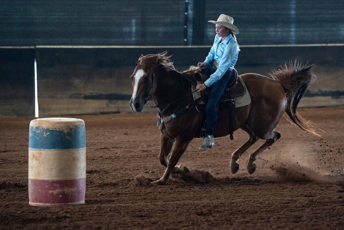 Kinsley McBride practices barrel racing with her horse Jet at the Harrison County Fairgrounds on Thursday, June 13, 2024.