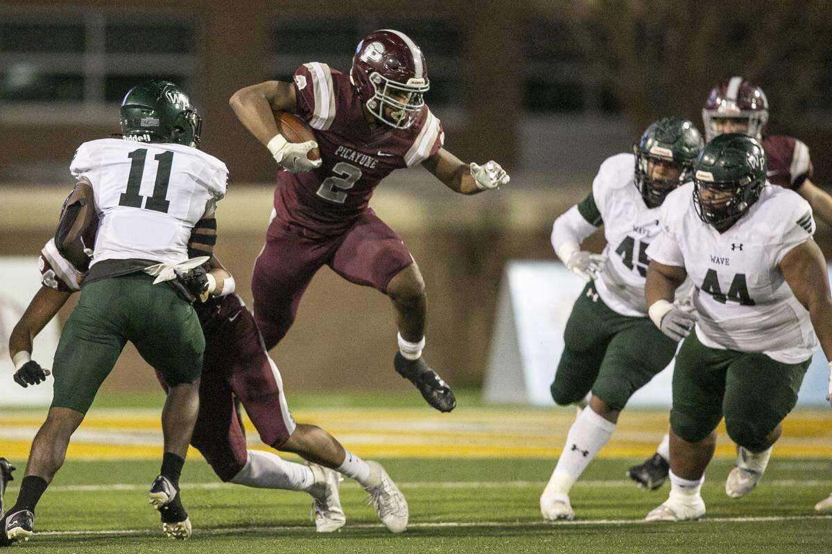 Picayune’s Dante Dowdell dodges around West Point during the 5A State Championship game at M.M. Roberts Stadium in Hattiesburg on Saturday, Dec. 4, 2021.