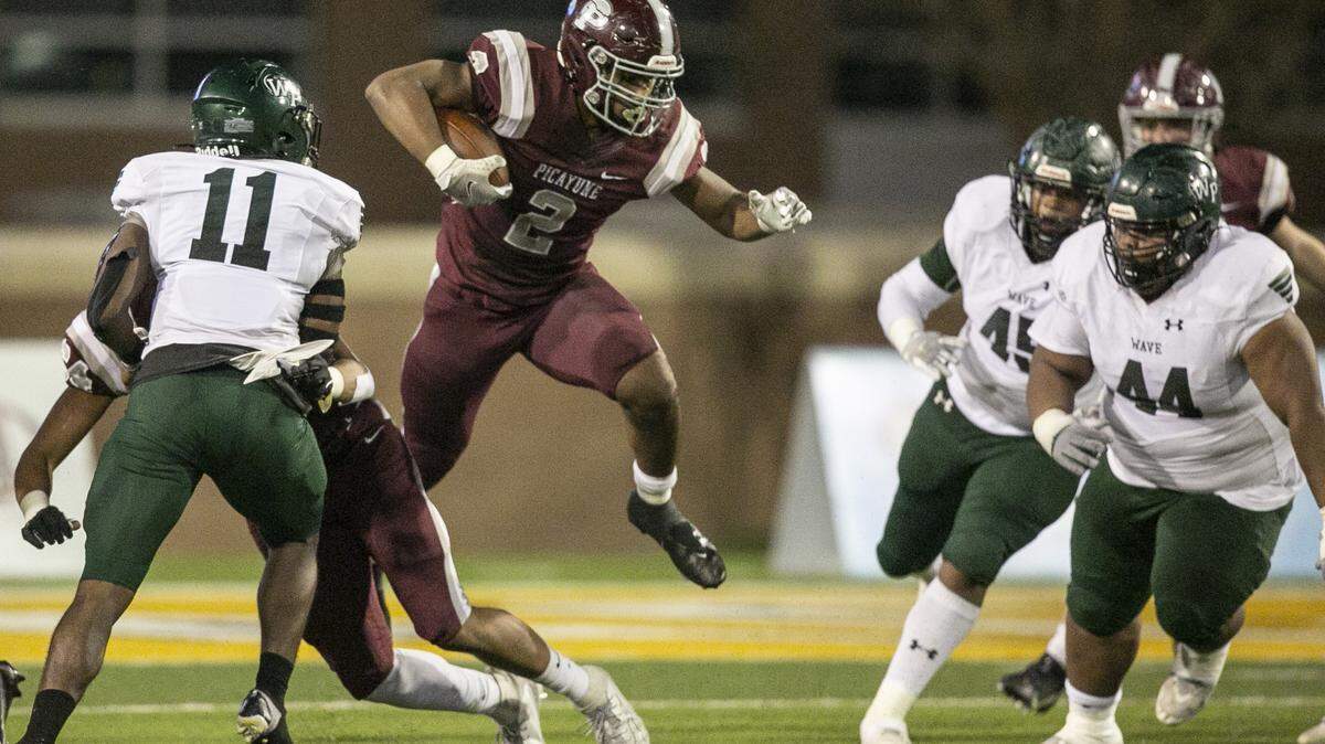 Picayune’s Dante Dowdell dodges around West Point during the 5A State Championship game at M.M. Roberts Stadium in Hattiesburg on Saturday, Dec. 4, 2021.