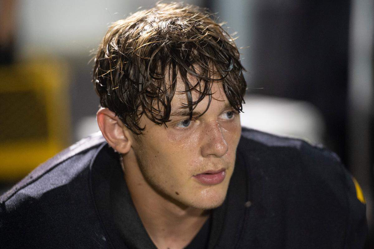 D’Iberville’s Landyn Shannon takes a rest on the sidelines after scoring a touchdown against Biloxi during a game at Warriors Stadium in D’Iberville on Friday, Sept. 23, 2022.