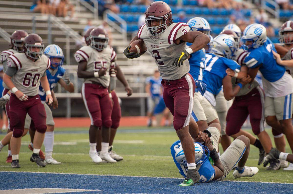 Picayune runningback Dante Dowdell walks into the end zone for a touchdown during a spring game against Ocean Springs at Greyhound Stadium in Ocean Springs on Friday, May 13, 2022.