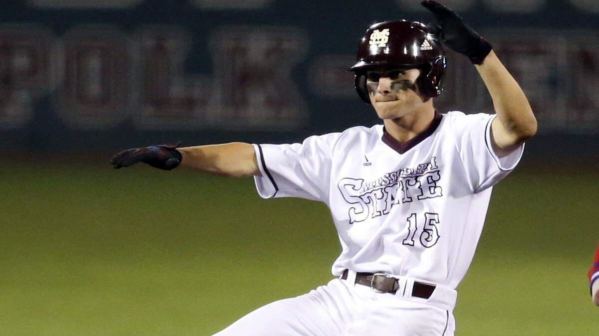 Mississippi State's Jake Mangum (15) urges his teammates ON during their NCAA Regional Baseball Tournament championship game against Louisiana Tech at Dudy Noble Field in Starkville, Miss., Sunday, June 5, 2016. (AP Photo/Rogelio V. Solis)