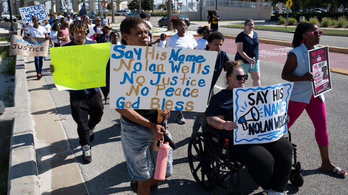 Dozens demand justice and transparency at two-mile walk for Nolan Wells