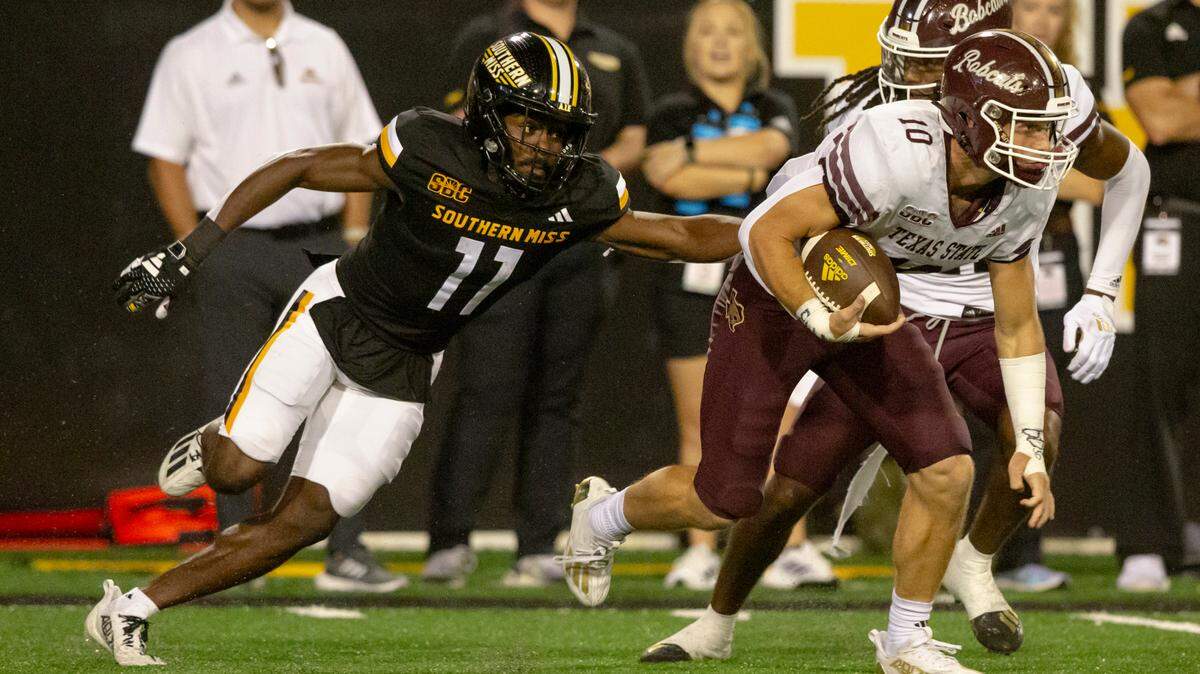 Southern Miss Golden Eagles cornerback MJ Daniels (11) chases after Texas State Bobcats wide receiver Joey Hobert (10) during a game against Texas State at M.M. Roberts Stadium in Hattiesburg on Saturday, Sept. 30, 2023.