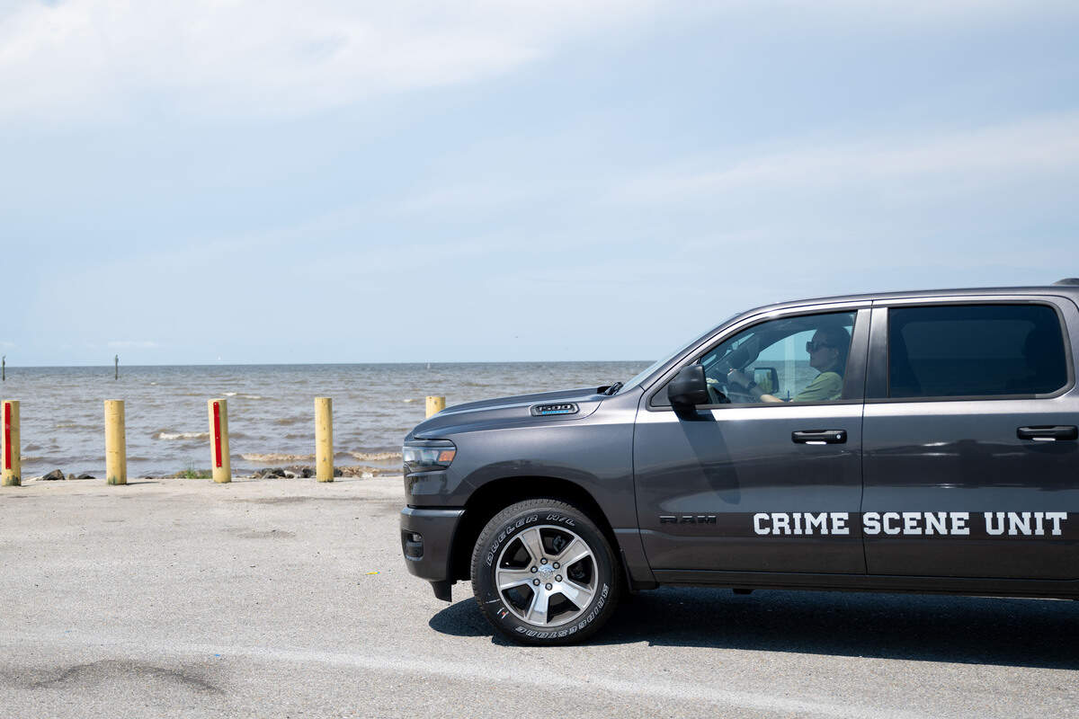 A truck from the Jackson County Crime Scene Unit drives in at Lake Mars Boat Launch on Monday, July 6, 2026.