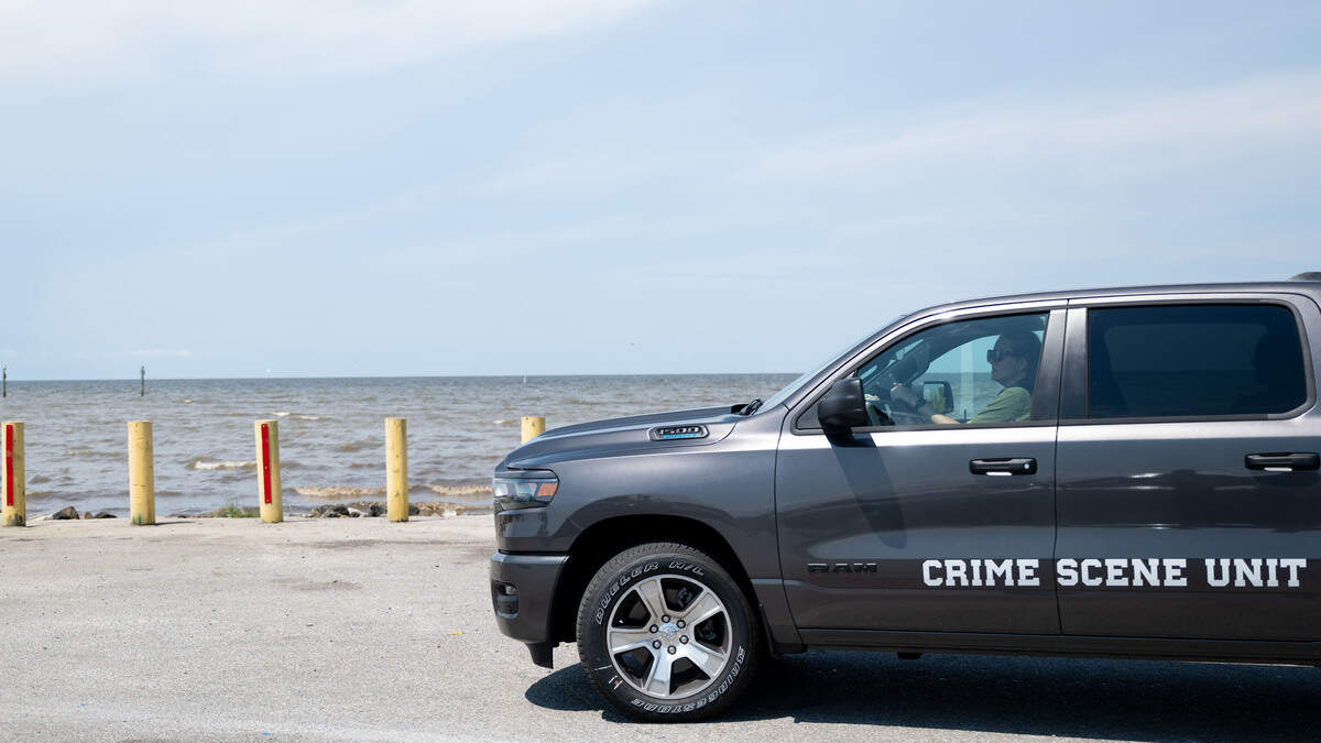A truck from the Jackson County Crime Scene Unit is seen at Lake Mars Boat Launch on Monday as part of the search for Nolan Wells.