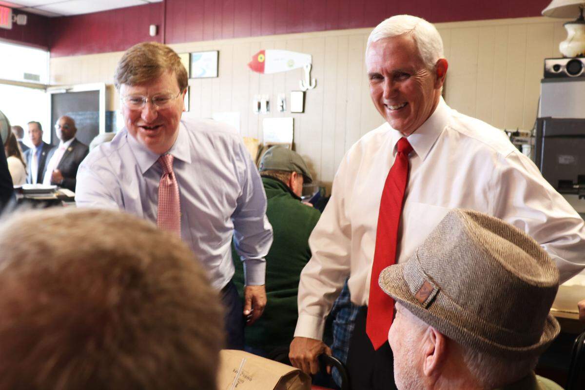 Former Vice President Mike Pence and then Mississippi Lt. Gov. Tate Reeves stop by The Palace Grill in Gulfport ahead of the rally Nov. 4, 2019. Pence and Reeves greeted the owners, staff and patrons and ordered meatloaf plates to go.