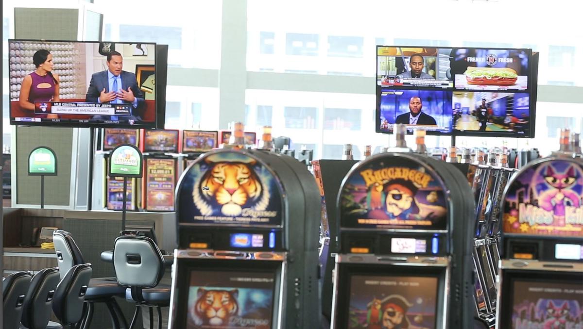 Sports TV shows play on TVs near slot machines at Island View Casino Resort’s new Beach Casino in Gulfport on Thursday, June 21, 2018. Island View will open two sports-betting parlors at its casinos north and south of U.S. 90, along with an on-property app, around the start of football season.