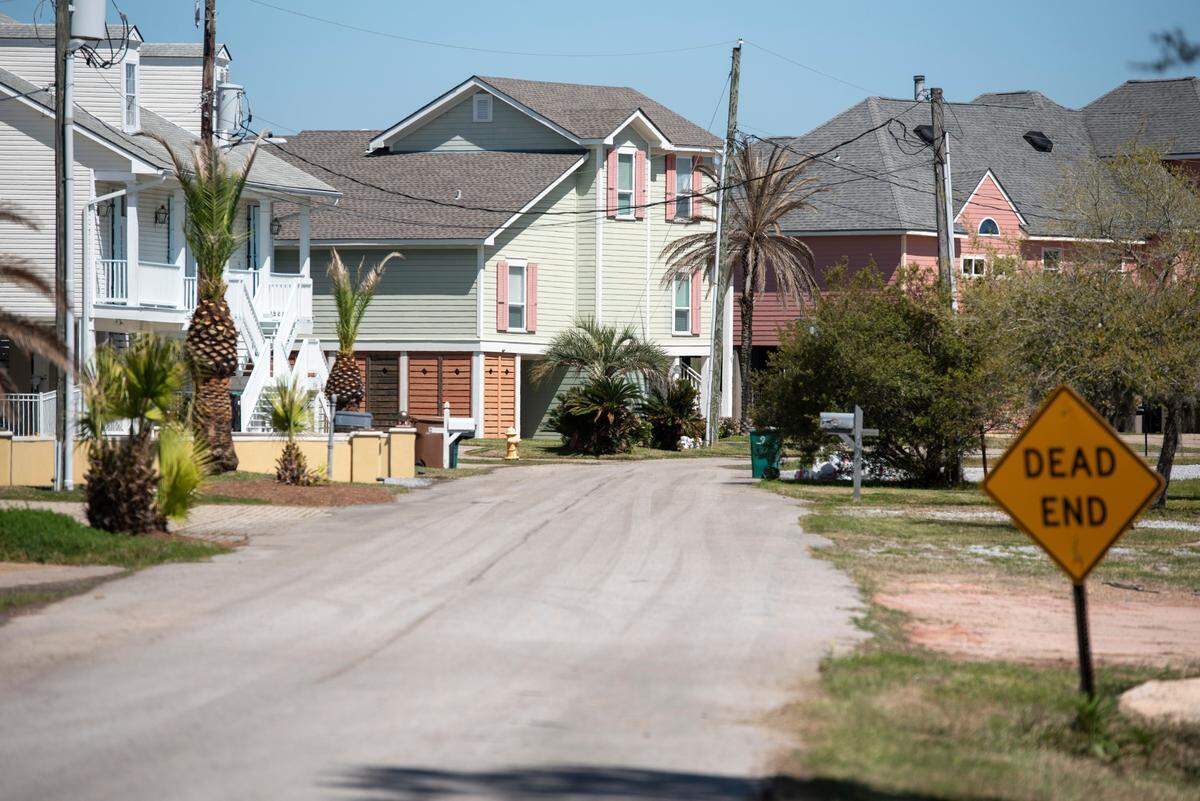 Homes along Sweetbay Drive in the Timber Ridge subdivision in Pass Christian on Tuesday, March 25, 2025.