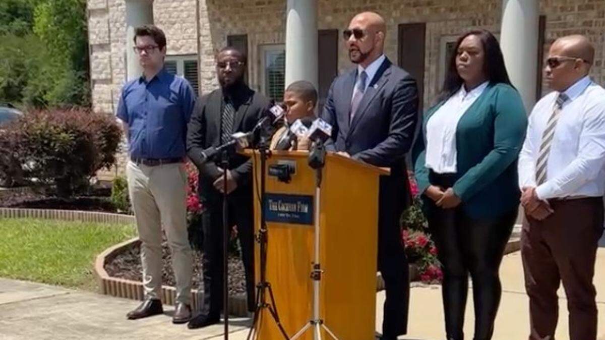 Attorney Carlos Moore holds news conference earlier this year outside his Grenada law office to announce the filing of a $5 million lawsuit against the city of Indianola, the police chief and Officer Greg Capers in the shooting of 11-year-old Aderrien Murry.