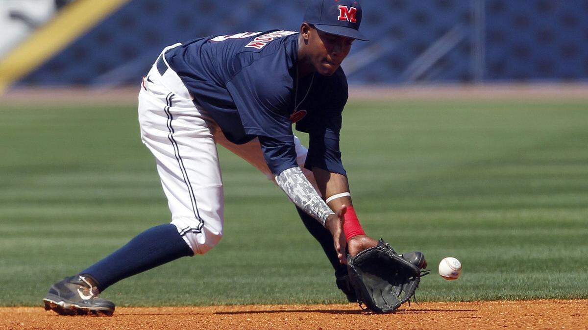 BUTCH DILL/ASSOCIATED PRESS 
 Ole Miss' Errol Robinson and the Rebels opened a three-game series against Kentucky on Thursday.