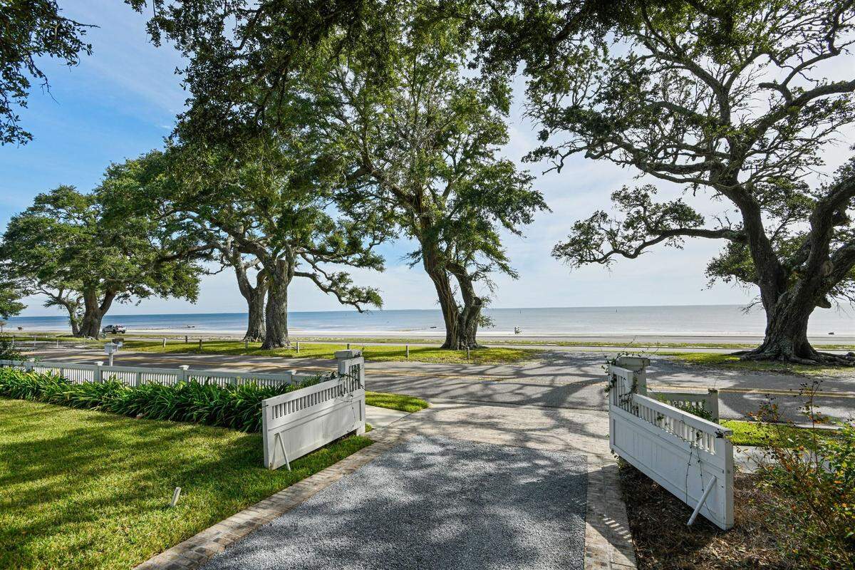 This for sale mansion in Pass Christian includes beachfront views.