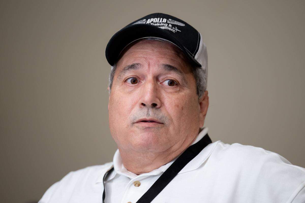 Michael Carastro speaks during a news conference Tuesday at Million Air terminal in Gulfport.