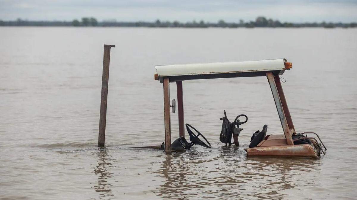 Farm equipment is nearly submerged in flood water in north Issaquena County in 2019.