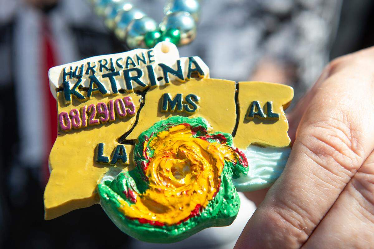 A string of beads with a Hurricane Katrina commemorative bead during the Jackson County Carnival Association Mardi Gras parade in Pascagoula on Saturday, March 1, 2025.