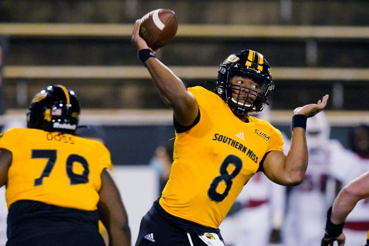 Southern Mississippi quarterback Trey Lowe throws a pass against Florida Atlantic during the first half of an NCAA college football game Thursday, Dec. 10, 2020, in Hattiesburg, Miss. (AP Photo/Rogelio V. Solis)