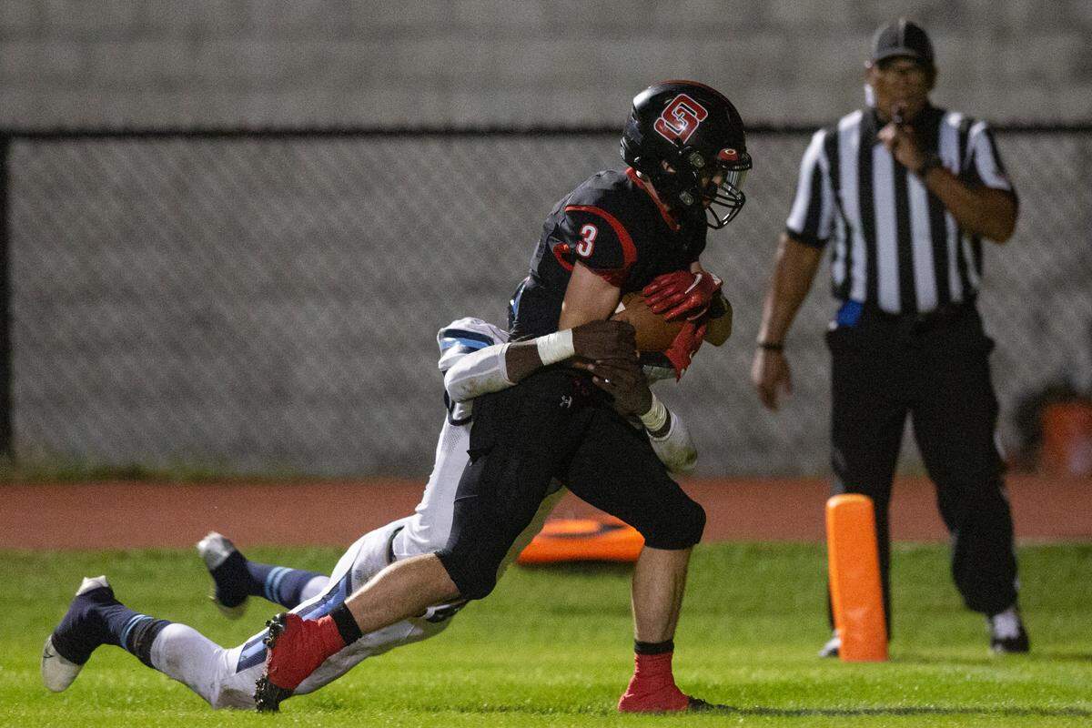 St. Stanislaus’ Brady Logan runs the ball into the end zone as he is tackled by a Port Gibson player during a playoff game against Port Gibson at St. Stanislaus in Bay St. Louis on Friday, Nov. 4, 2022.