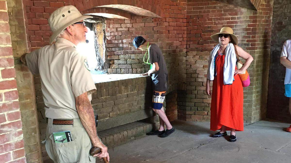 Jack Madison Leading a Tour Group Inside Fort Massachusetts