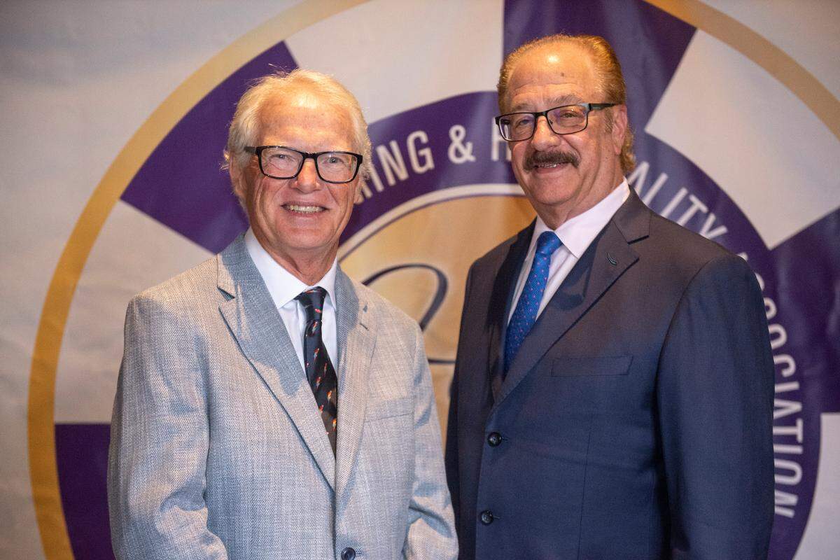 Mississippi Gaming and Hospitality Association Hall of Fame inductees Tim Hinkley and Jon Lucas, right, pose for a portrait at the Mississippi Gaming and Hospitality Association Hall of Fame Gala at the Beau Rivage in Biloxi on Thursday, June 27, 2024.
