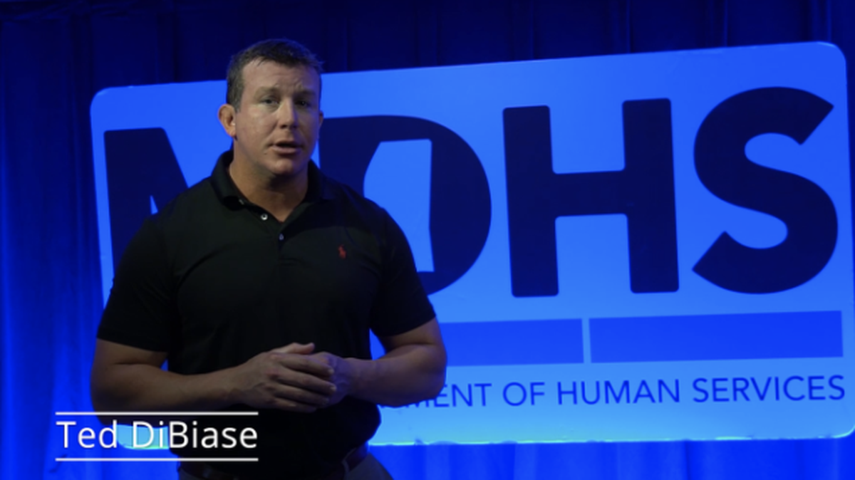 Ted “Teddy” DiBiase Jr. appears in a 2019 internal Mississippi Department of Human Services video message to agency workers.