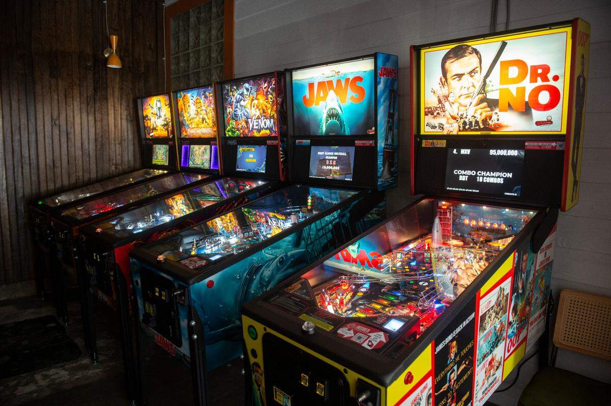 An arcade at The Garage at Cash Alley in Ocean Springs on Friday, Dec. 13, 2024, features pinball machines inspired by old movies and pop culture.