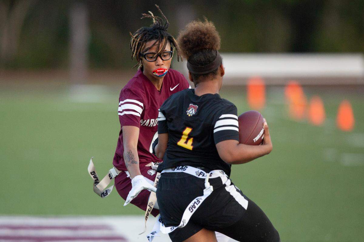 Picayune’s A’miya Graves tries to pull a flag during a game against Perry Central at Lee-Triplett Stadium in Picayune on Thursday, March 27, 2025.