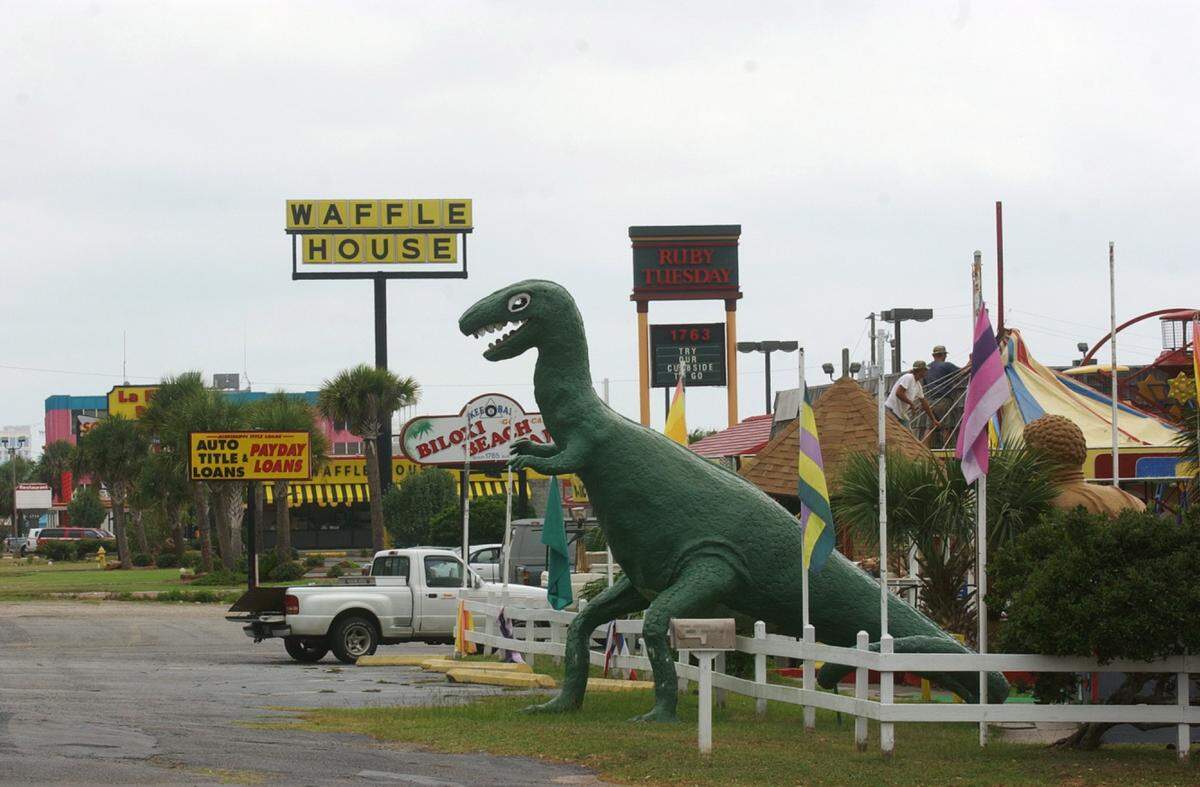 Rex, the 15-foot dinosaur that stood over Biloxi Beach Amusement Park, was an icon of hurricane survival after Hurricane Camille.