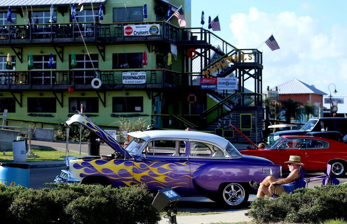 Cruisers roll into downtown Bay St. Louis for Cruisin’ The Coast on Thursday, October 4, 2018.