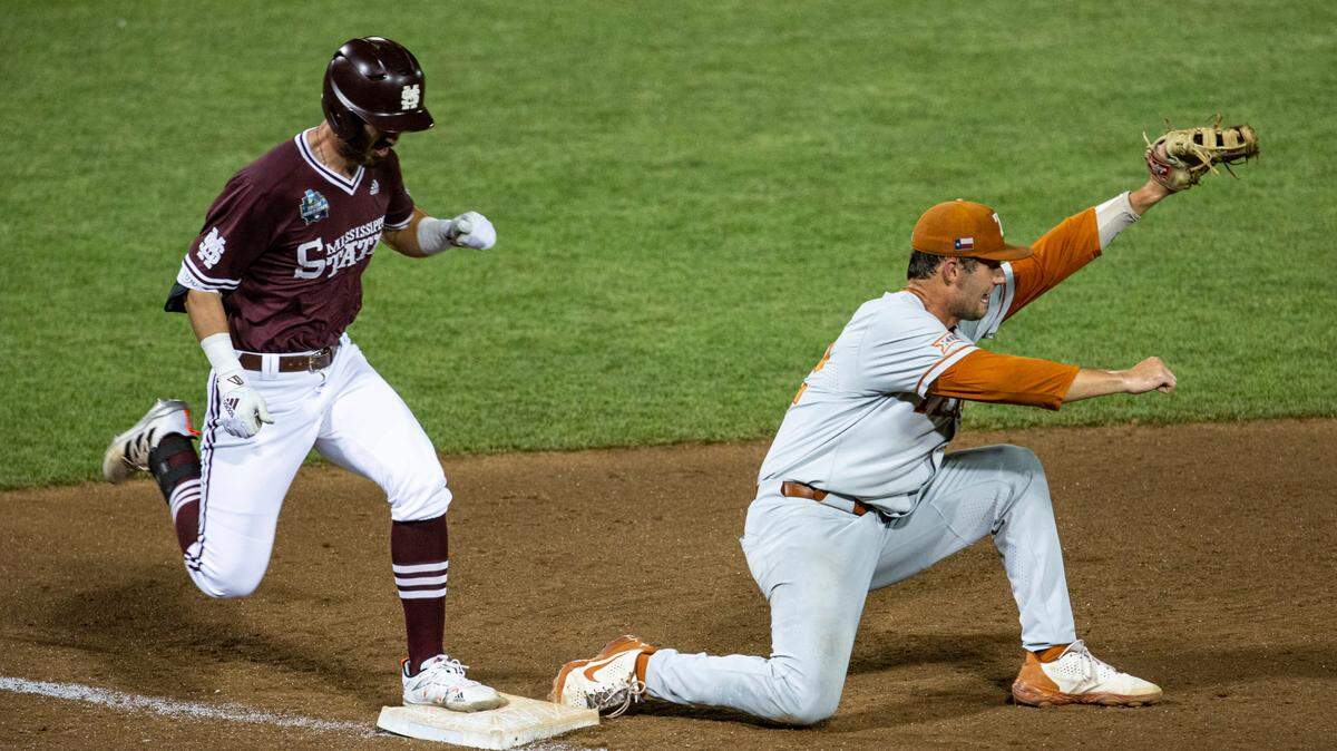 Mississippi State’s Josh Hatcher (10) is safe at first base against Texas’s Zach Zubia (52) in the seventh inning during a baseball game in the College World Series Friday June 25, 2021, at TD Ameritrade Park in Omaha, Neb. (AP Photo/John Peterson)